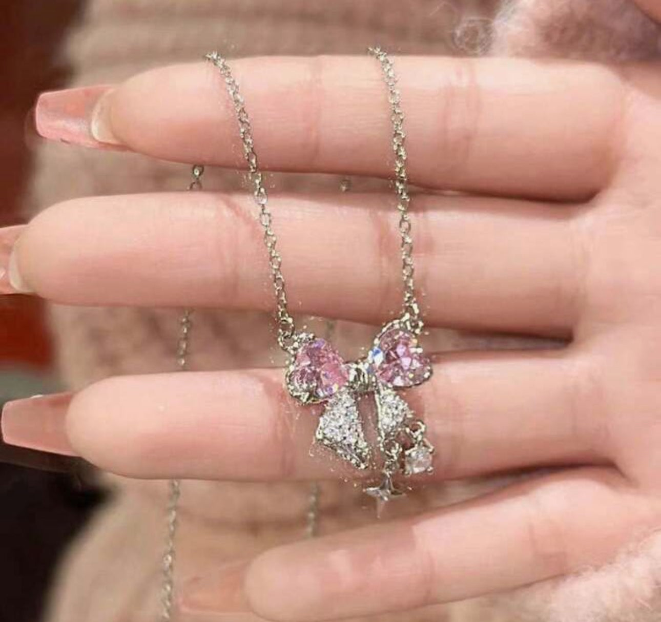 Collier noeud rose acier inoxydable